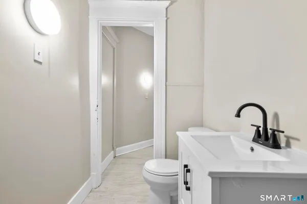 a bathroom with a sink and a toilet