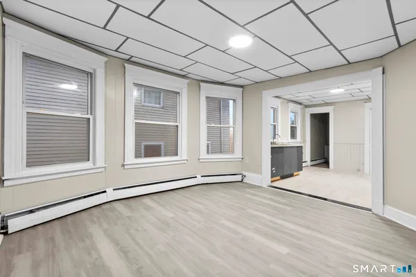 a view of an empty room with a window