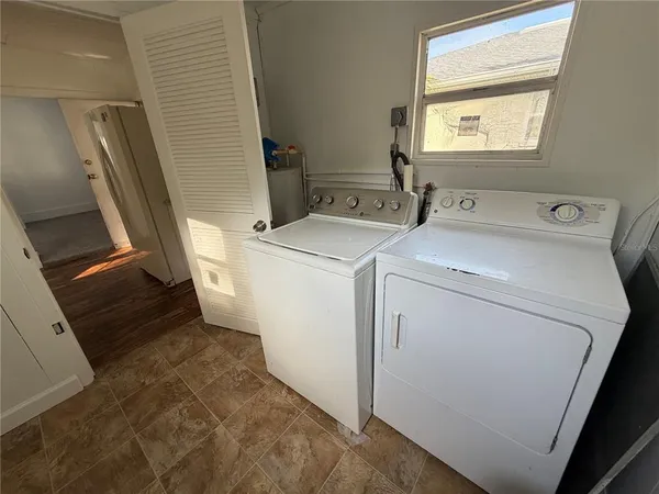 a utility room with dryer and washer