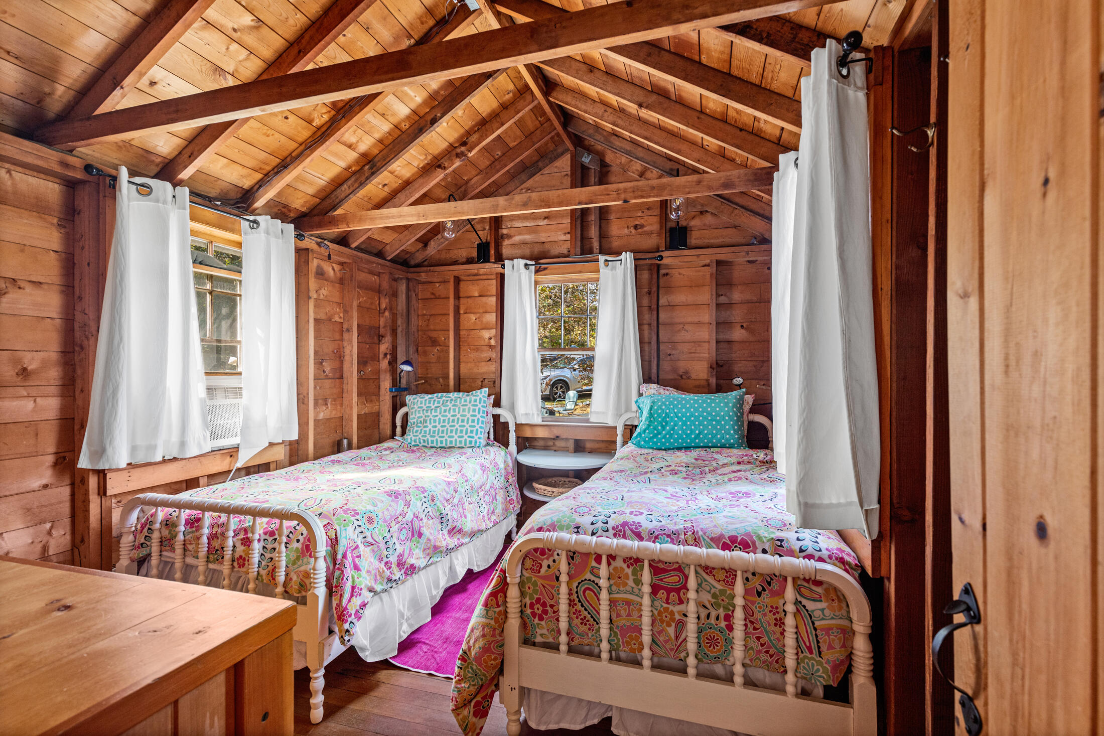 135 Nauset Light Beach Road Eastham, MA 02642 - Photo 15 of 34 a bedroom with two beds and a window