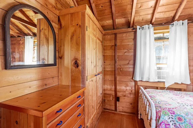 a bathroom with a tub and a sink