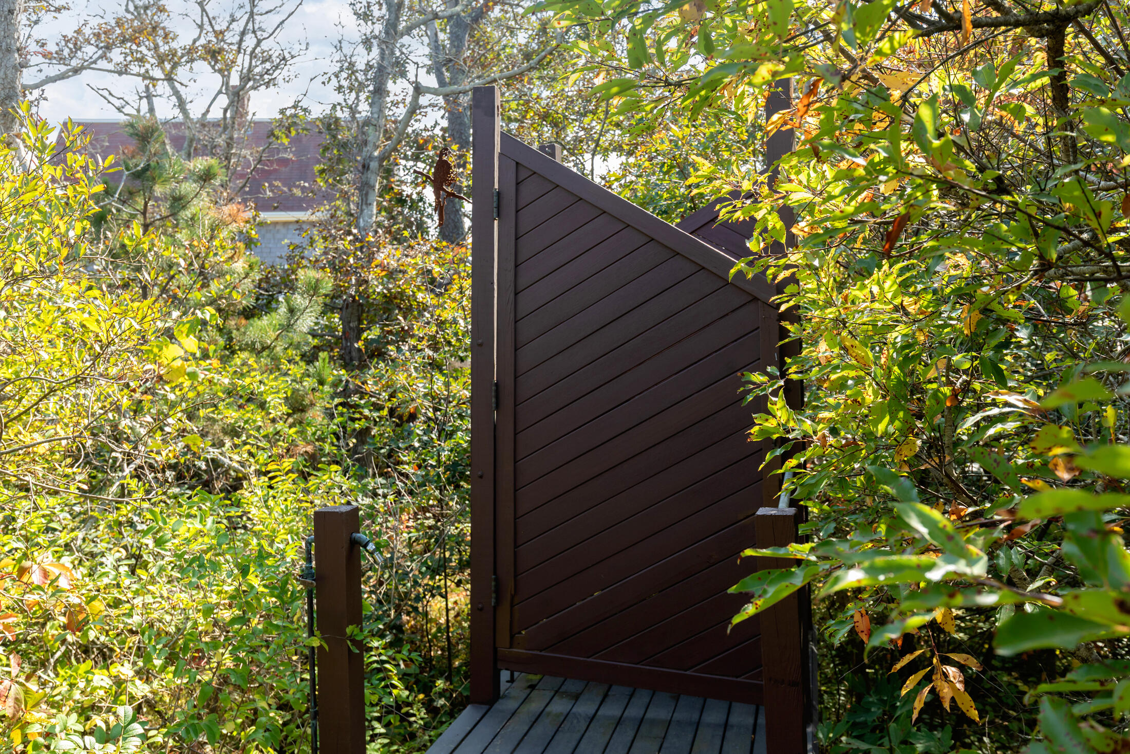 135 Nauset Light Beach Road Eastham, MA 02642 - Photo 23 of 34 a backyard of a house