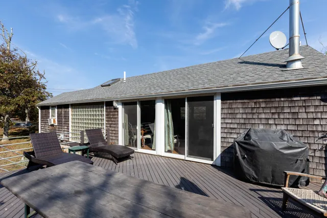 a backyard of a house with seating space