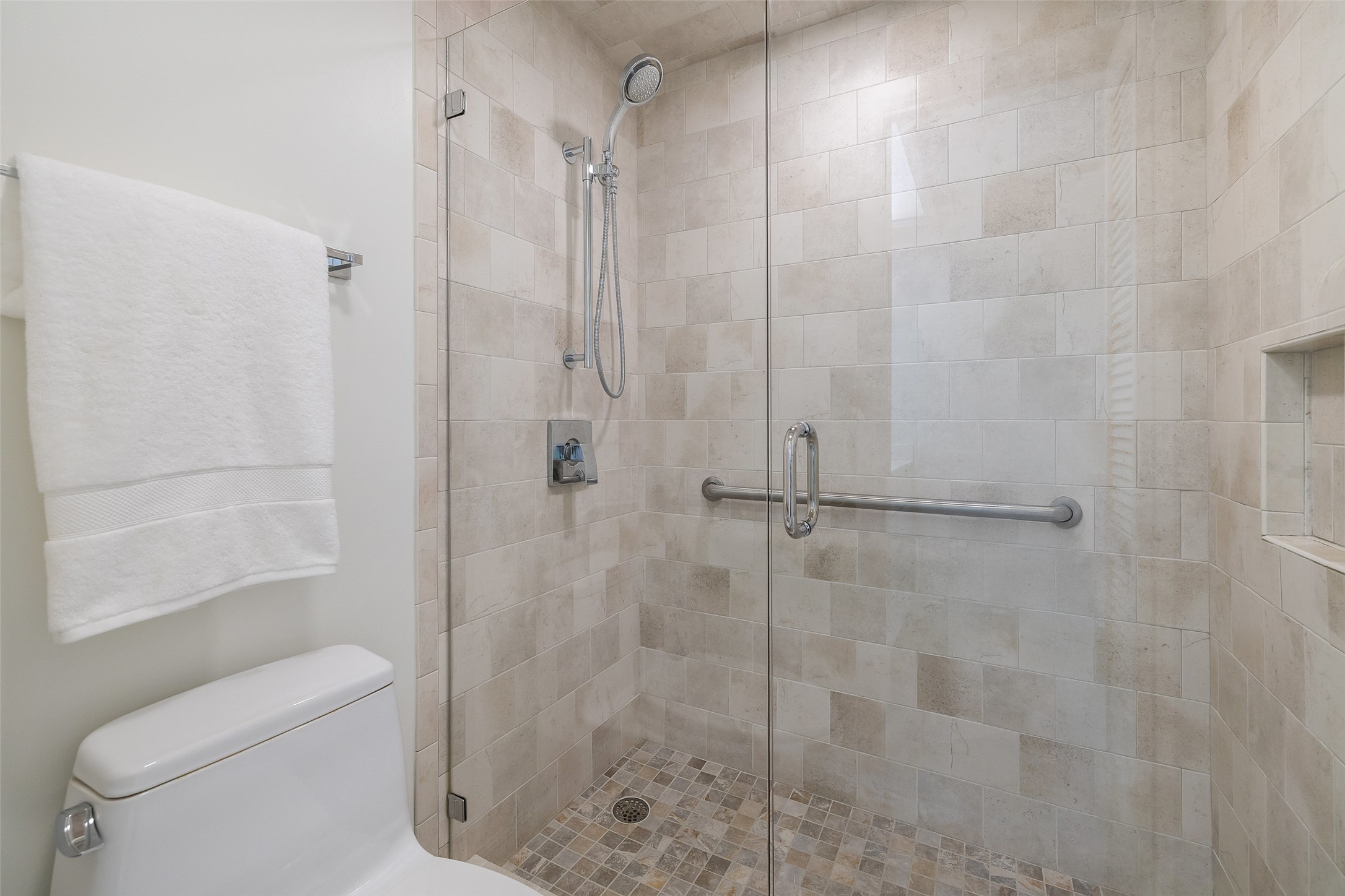 1801 Lavaca Street, Unit 13EF Austin, TX 78701 - Photo 29 of 40 Full bath with a shower stall and toilet