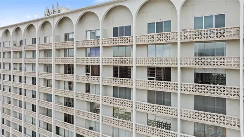 a front view of a multi story building