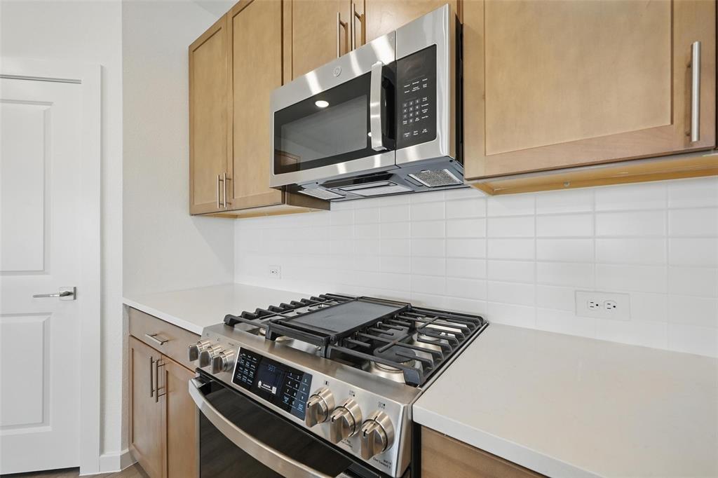 1413 Richardson Street Howe, TX 75459 - Photo 8 of 30 Stainless steel range with a built-in griddle and digital interface
