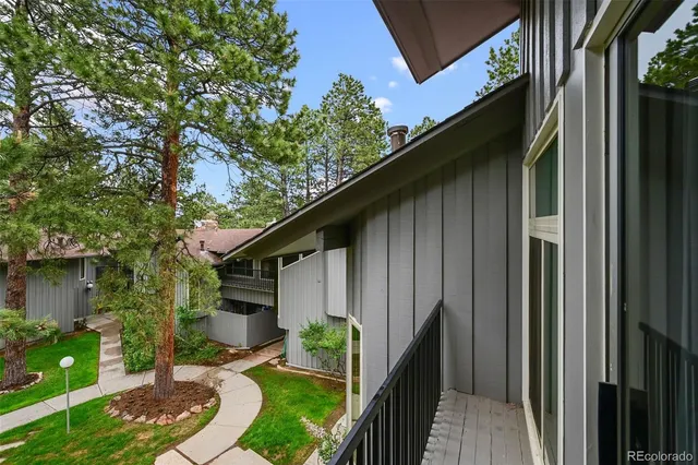 a backyard of a house with plants