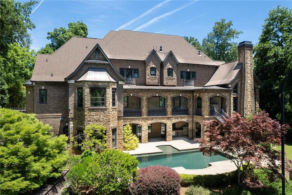 4934 Powers Ferry Road Northwest Sandy Springs, GA 30327 - Photo 1 of 1 Back balconies overlooking the pool and tennis court