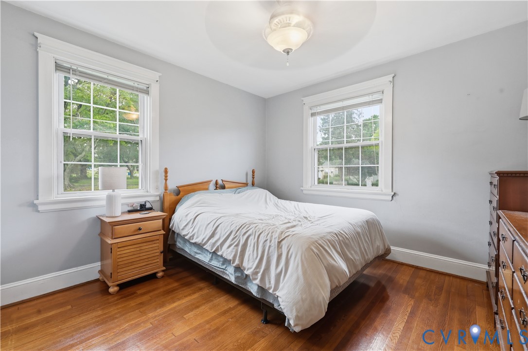 8077 Signal Hill Road Mechanicsville, VA 23111 - Photo 19 of 24 Bedroom featuring two double-hung windows with whi