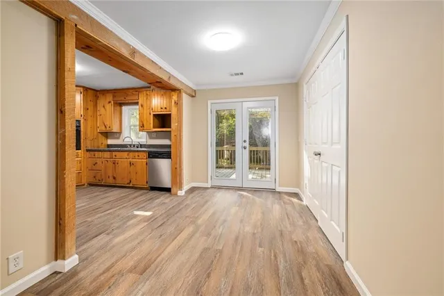 a view of a kitchen with a sink and a stove