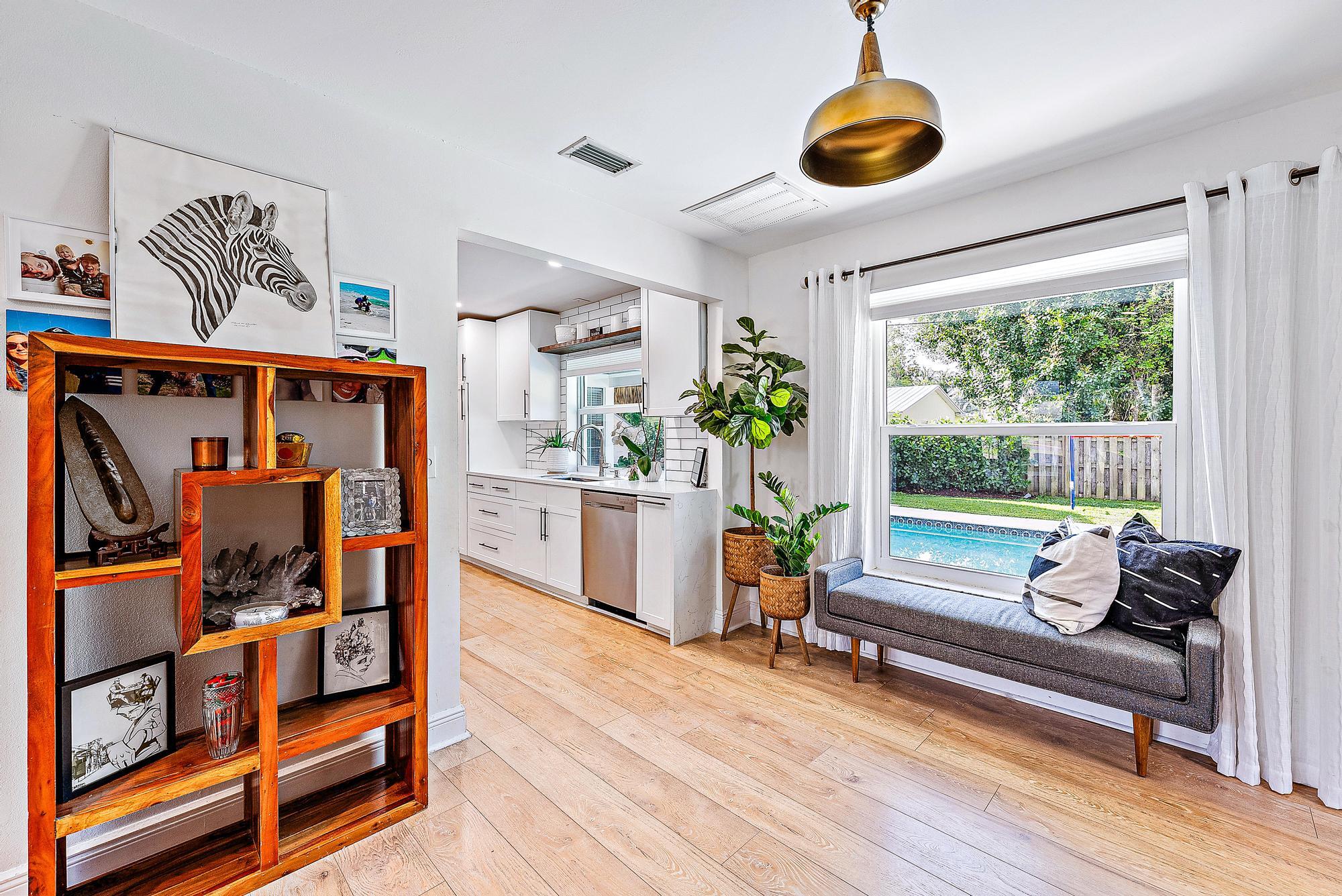 226 Norfolk Road Jupiter, FL 33469 - Photo 7 of 33 Living Area Overlooking Pool