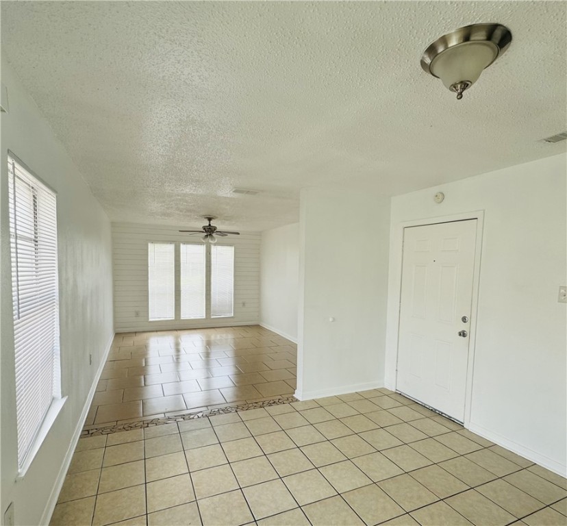 2119 Zephyr Ingleside, TX 78362 - Photo 2 of 9 an empty room with windows
