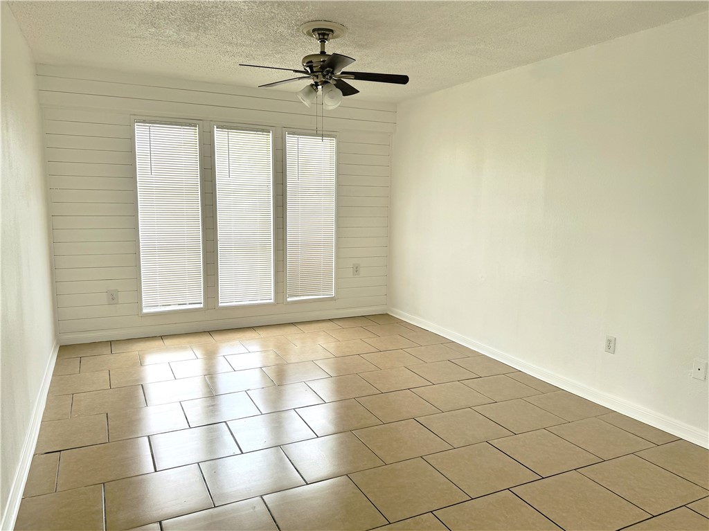 2119 Zephyr Ingleside, TX 78362 - Photo 3 of 9 a view of an empty room and window