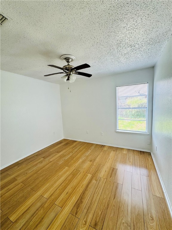 2119 Zephyr Ingleside, TX 78362 - Photo 9 of 9 a view of a room with wooden floor and white walls