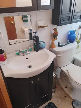 a bathroom with a sink and a toilet