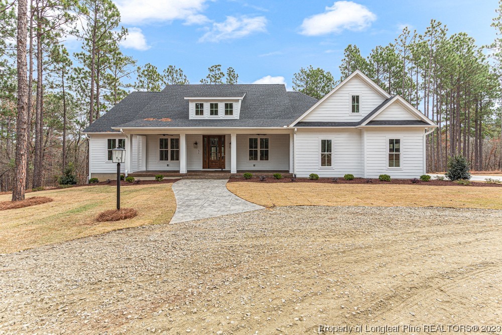 1365 McCaskill Road Carthage, NC 28327 - Photo 1 of 50 a view of a house with a yard