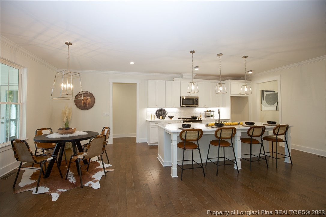 1365 McCaskill Road Carthage, NC 28327 - Photo 11 of 50 a view of a dining area with furniture