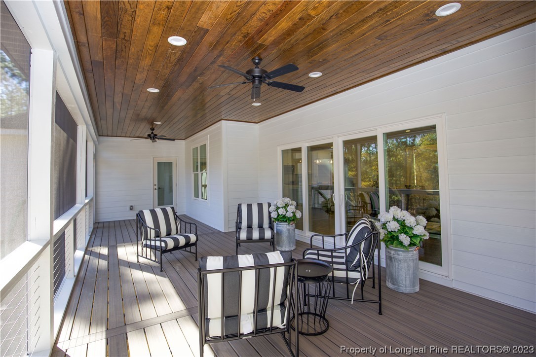1365 McCaskill Road Carthage, NC 28327 - Photo 20 of 50 a view of a dining room with furniture window and wooden floor