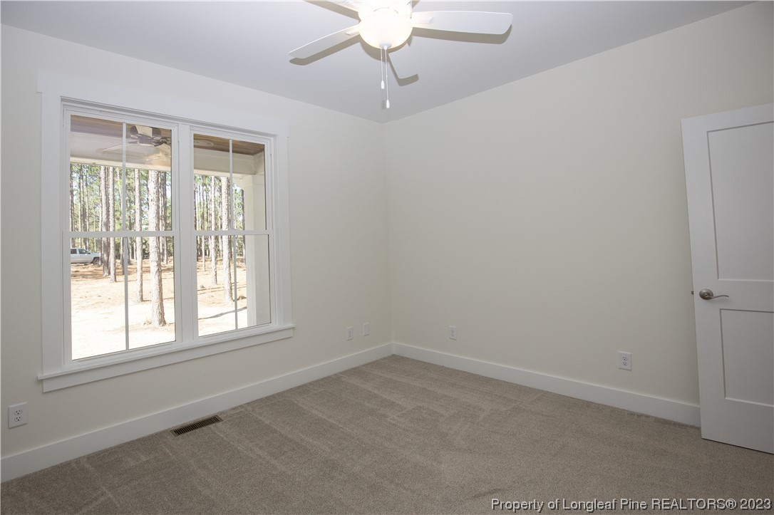 1365 McCaskill Road Carthage, NC 28327 - Photo 28 of 50 a view of an empty room with a window