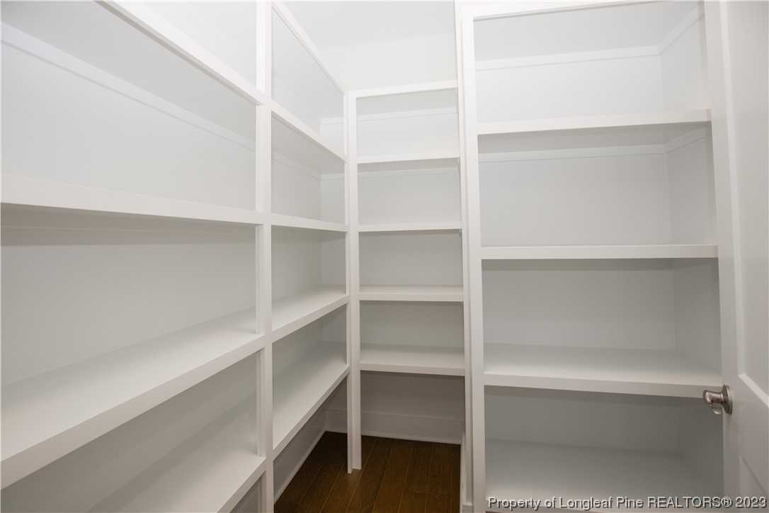 1365 McCaskill Road Carthage, NC 28327 - Photo 33 of 50 a view of walk in closet with empty racks