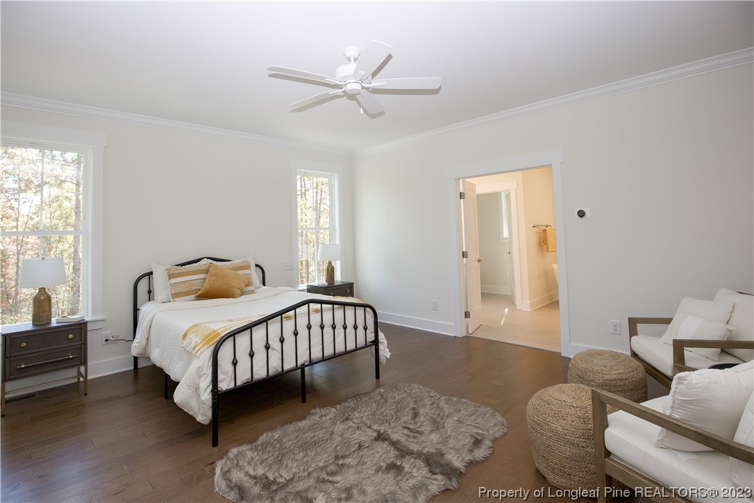 1365 McCaskill Road Carthage, NC 28327 - Photo 34 of 50 a bedroom with a bed window and a couch