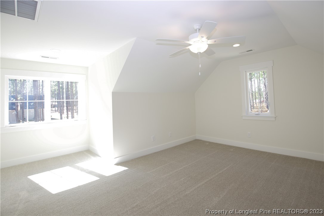 1365 McCaskill Road Carthage, NC 28327 - Photo 44 of 50 an empty room with windows and entrance