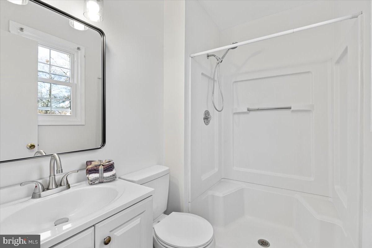 11654 Kipling Drive Waldorf, MD 20601 - Photo 12 of 33 a bathroom with a sink toilet and shower