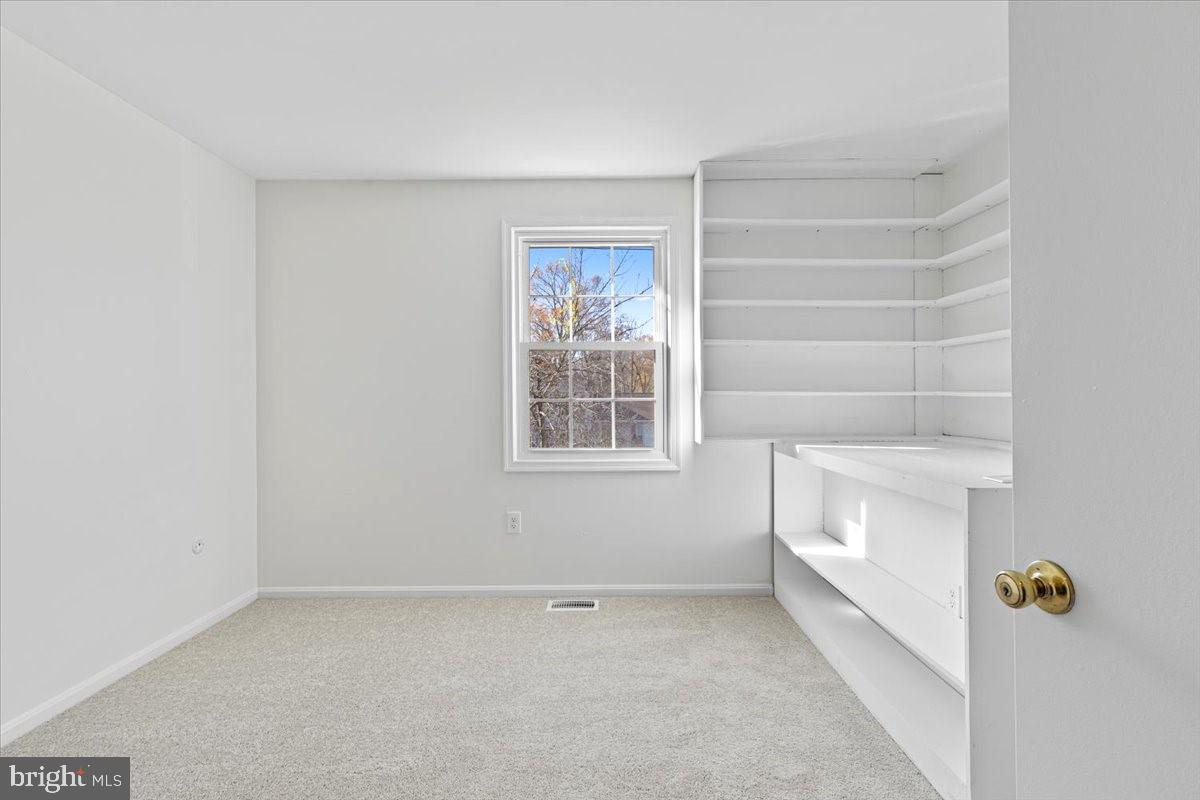 11654 Kipling Drive Waldorf, MD 20601 - Photo 16 of 33 a view of an empty room with a window