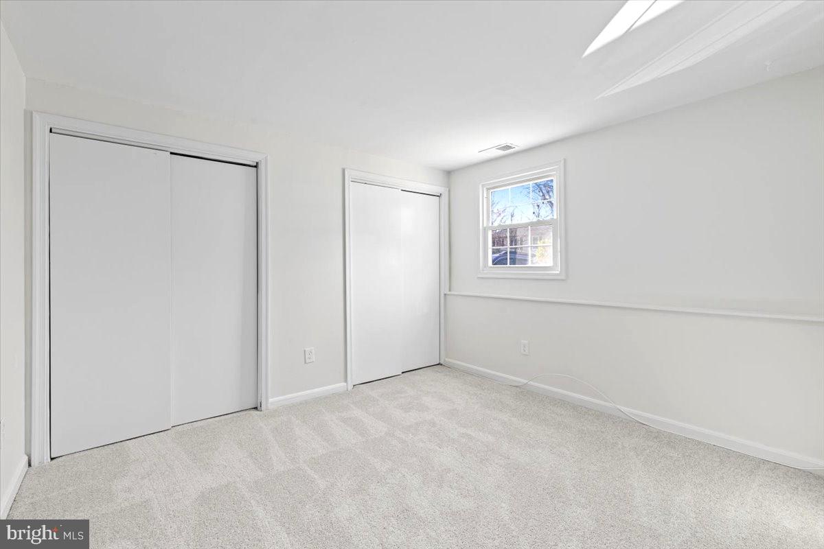 11654 Kipling Drive Waldorf, MD 20601 - Photo 24 of 33 a view of an empty room with a window
