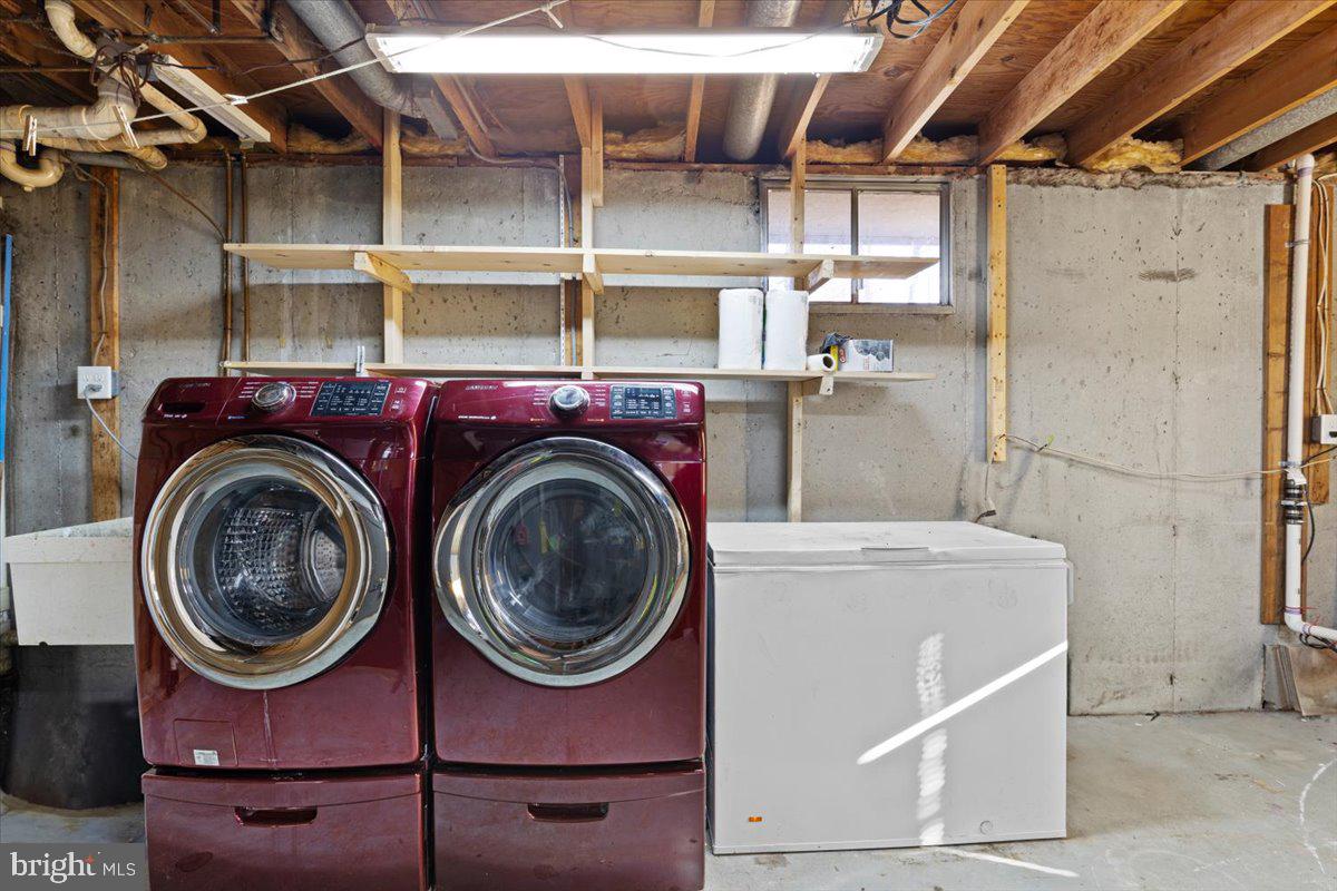 11654 Kipling Drive Waldorf, MD 20601 - Photo 25 of 33 a utility room with dryer and washer