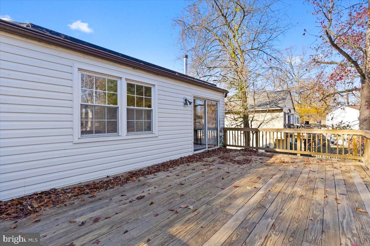 11654 Kipling Drive Waldorf, MD 20601 - Photo 27 of 33 a view of a house with a wooden deck