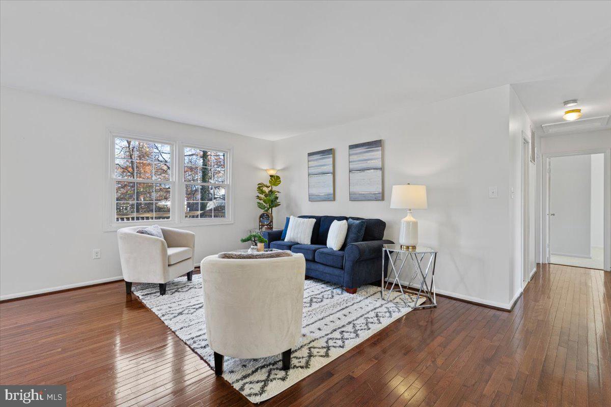 11654 Kipling Drive Waldorf, MD 20601 - Photo 4 of 33 a living room with furniture and wooden floor