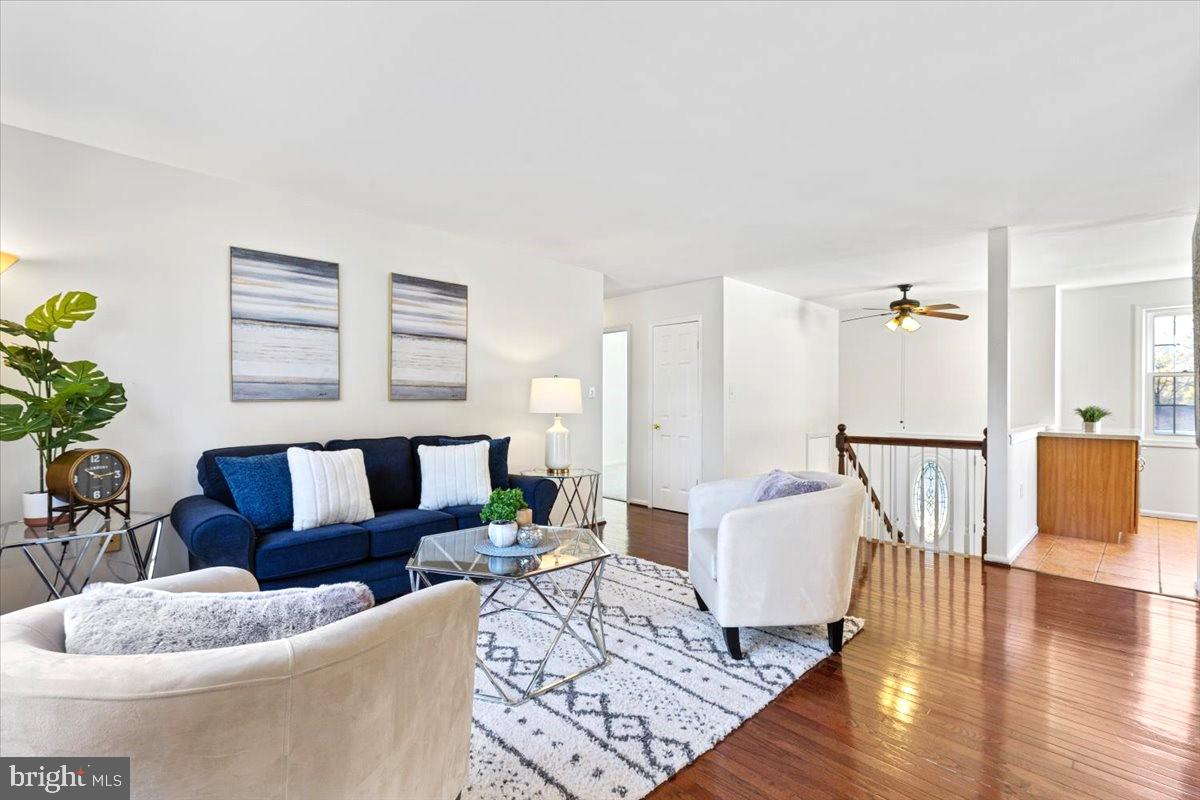 11654 Kipling Drive Waldorf, MD 20601 - Photo 5 of 33 a living room with furniture and wooden floor