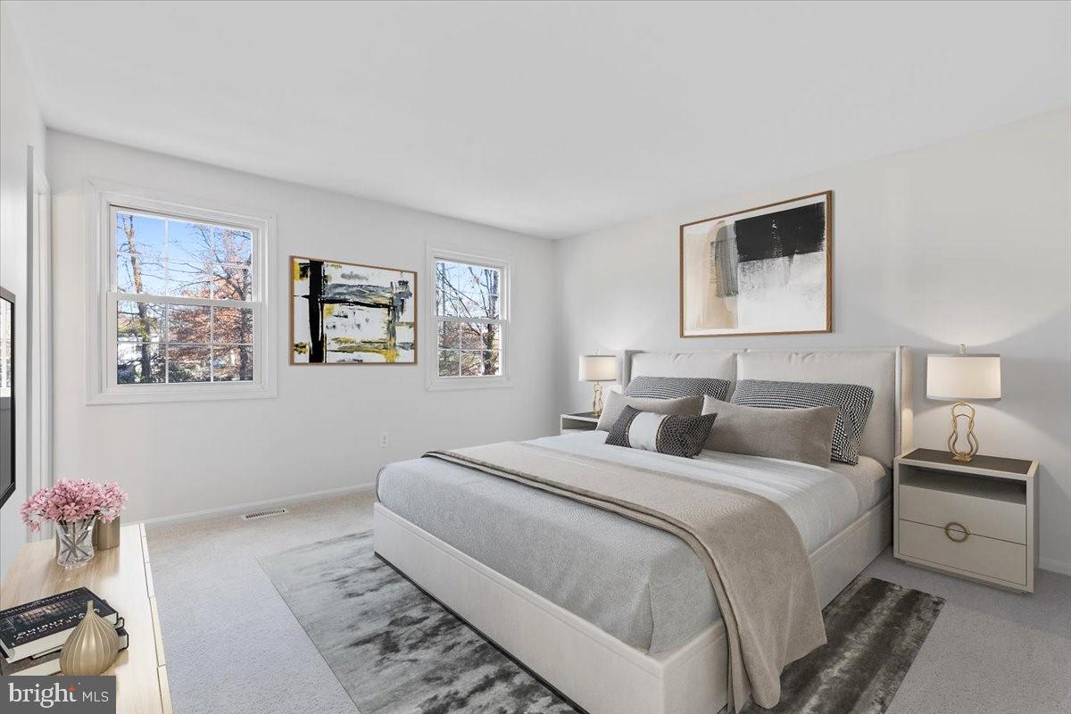 11654 Kipling Drive Waldorf, MD 20601 - Photo 10 of 33 a bedroom with a bed and a painting on the wall