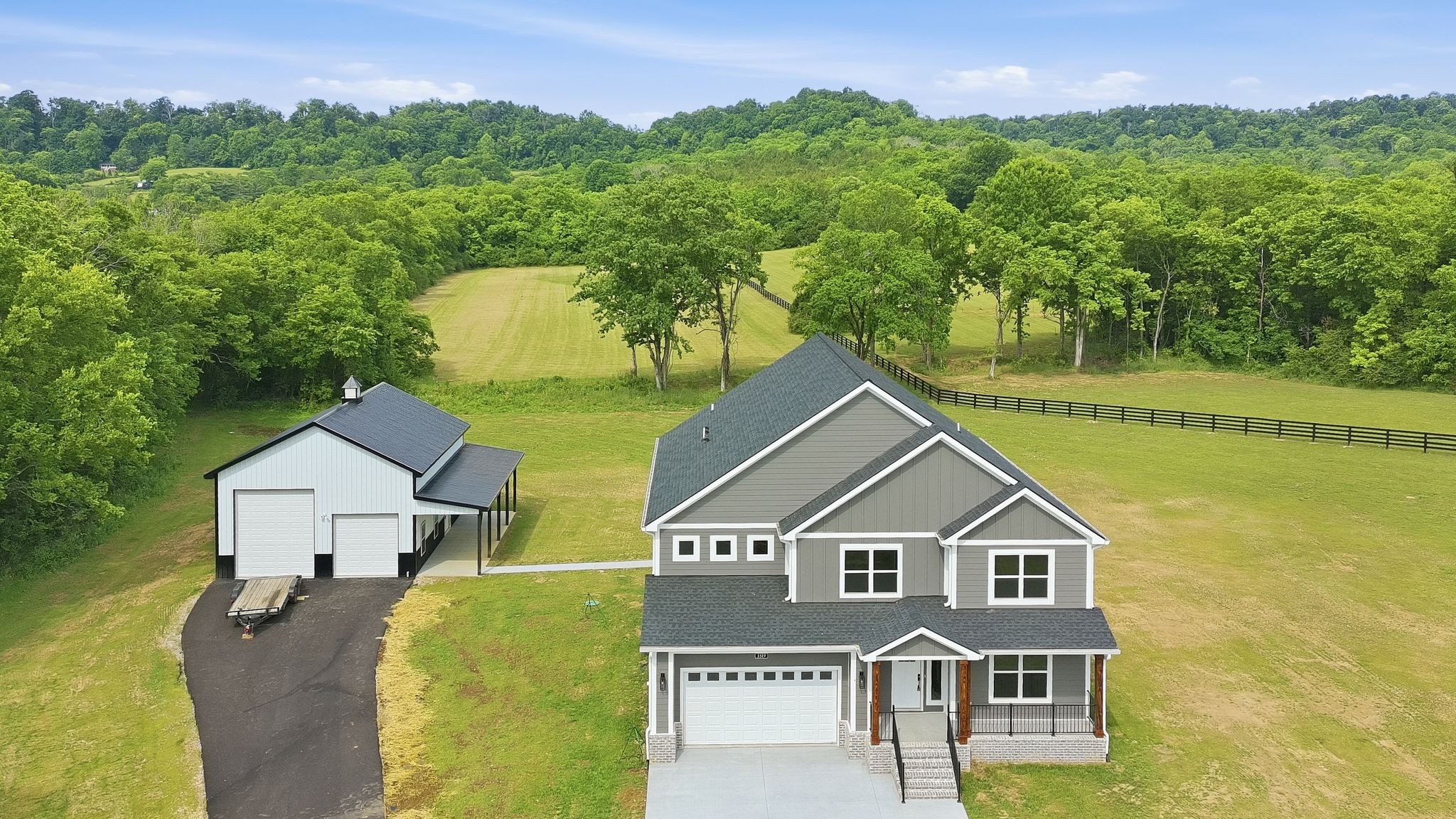 3319 Booker Ridge Road Mount Pleasant, TN 38474 - Photo 9 of 51 an aerial view of a house