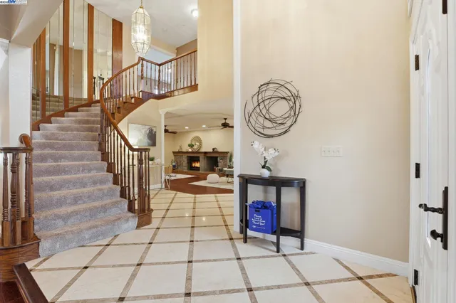 a view of an entryway with wooden floor