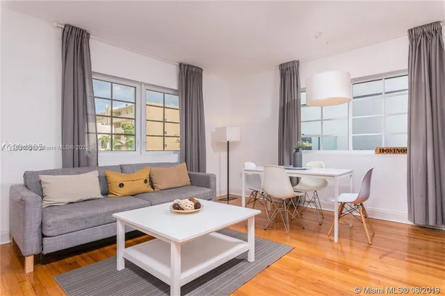 a living room with a couch and a table