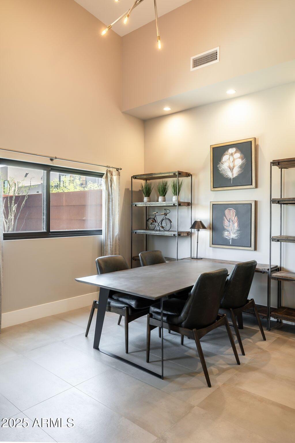 6525 East Cave Creek Road, Unit 31 Cave Creek, AZ 85331 - Photo 16 of 49 a workspace with furniture and a large window