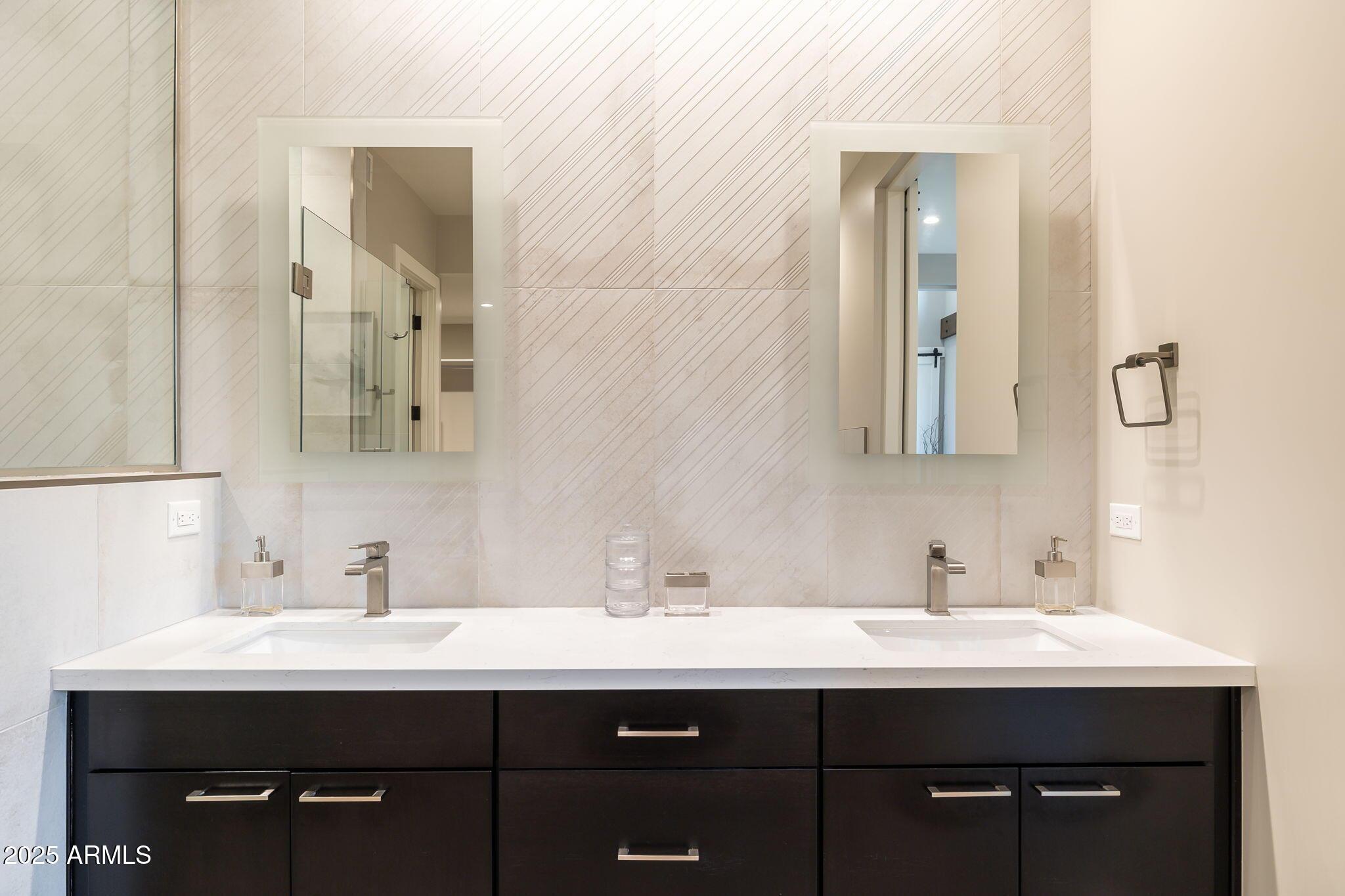 6525 East Cave Creek Road, Unit 31 Cave Creek, AZ 85331 - Photo 24 of 49 a bathroom with a sink and a mirror