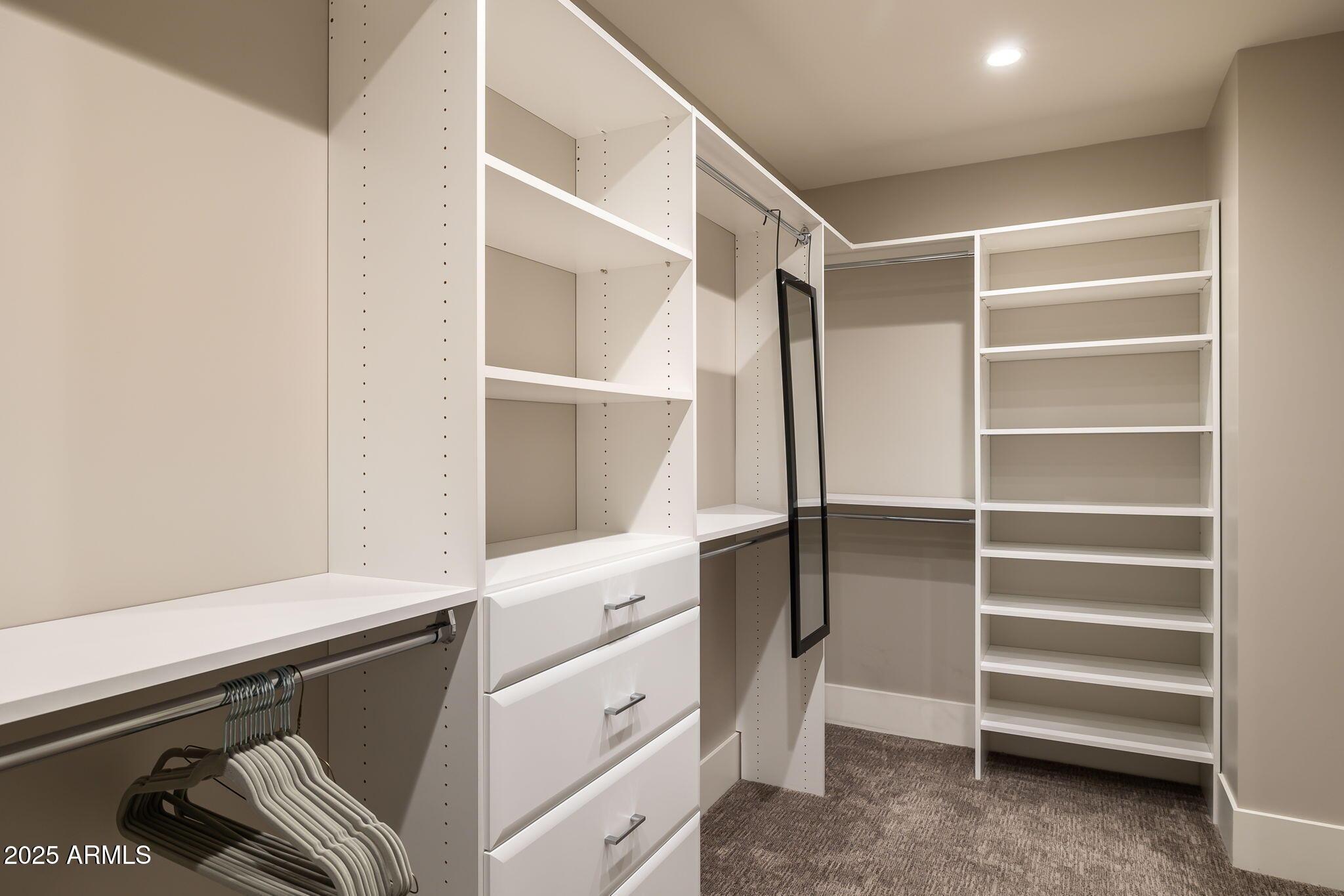 6525 East Cave Creek Road, Unit 31 Cave Creek, AZ 85331 - Photo 28 of 49 a view of walk in closet with empty racks