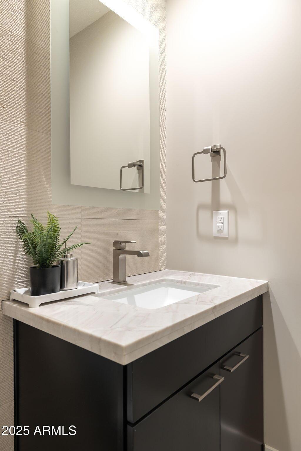 6525 East Cave Creek Road, Unit 31 Cave Creek, AZ 85331 - Photo 38 of 49 a bathroom with a sink and a mirror