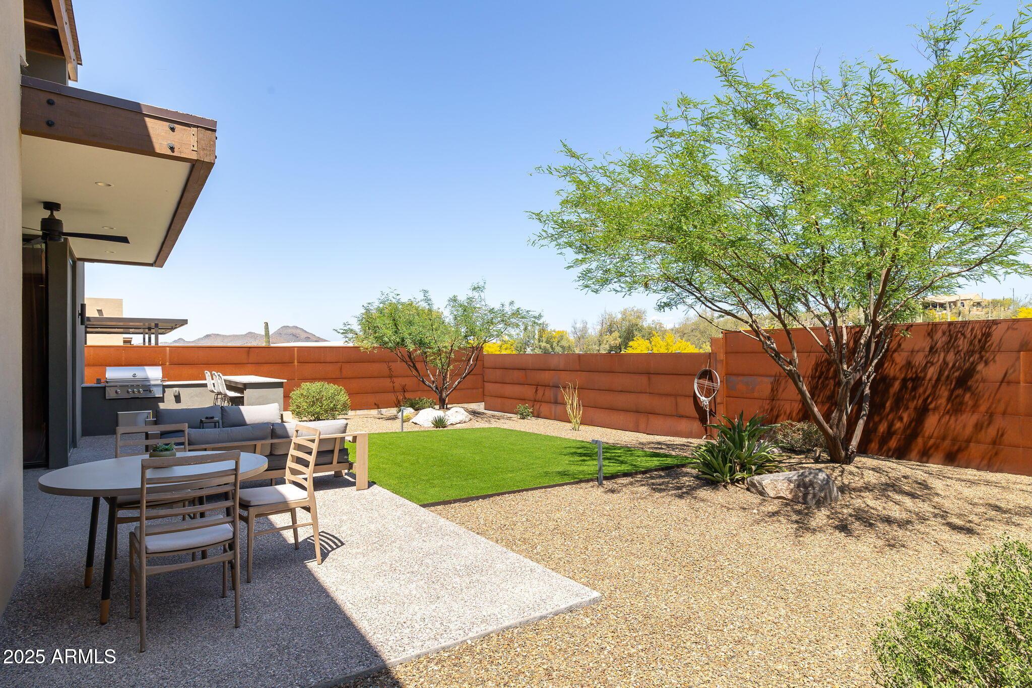 6525 East Cave Creek Road, Unit 31 Cave Creek, AZ 85331 - Photo 42 of 49 a view of a backyard with sitting area