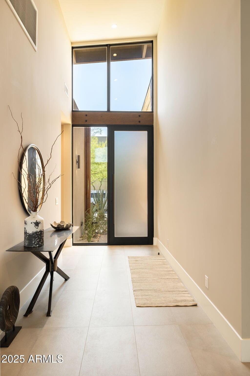 6525 East Cave Creek Road, Unit 31 Cave Creek, AZ 85331 - Photo 7 of 49 a view of an entryway with wooden floor