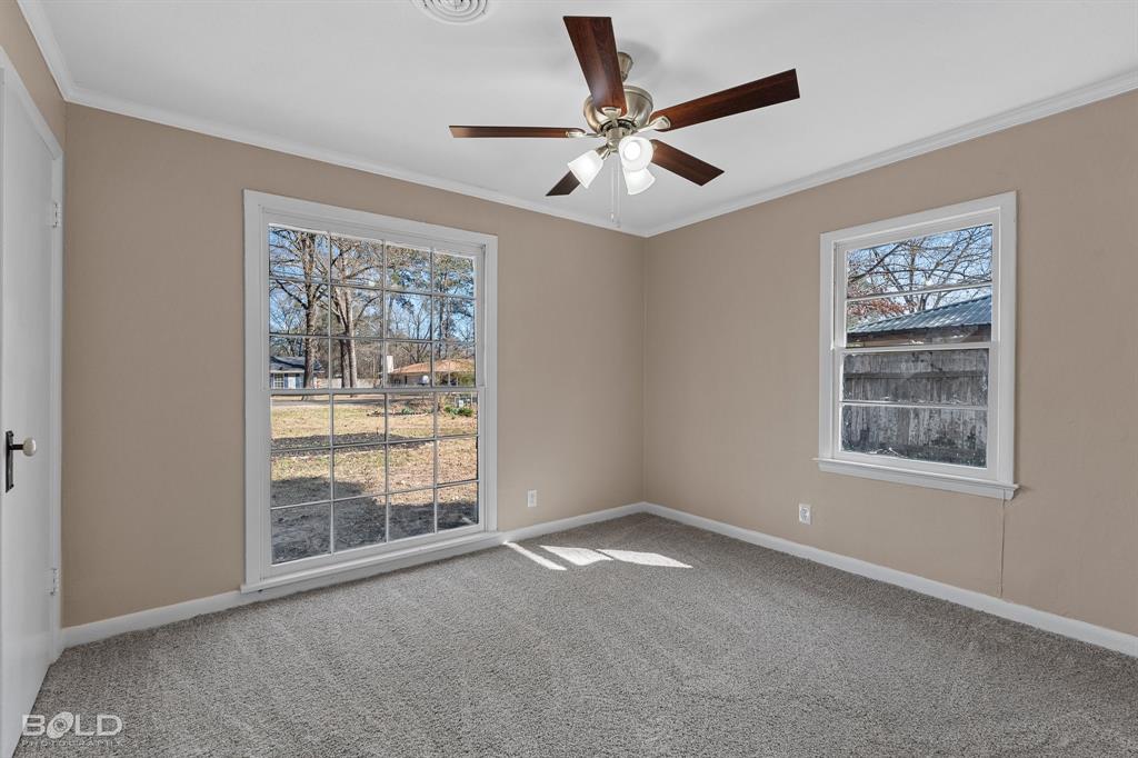 1211 Lee Street Benton, LA 71006 - Photo 19 of 39 a view of an empty room with a window