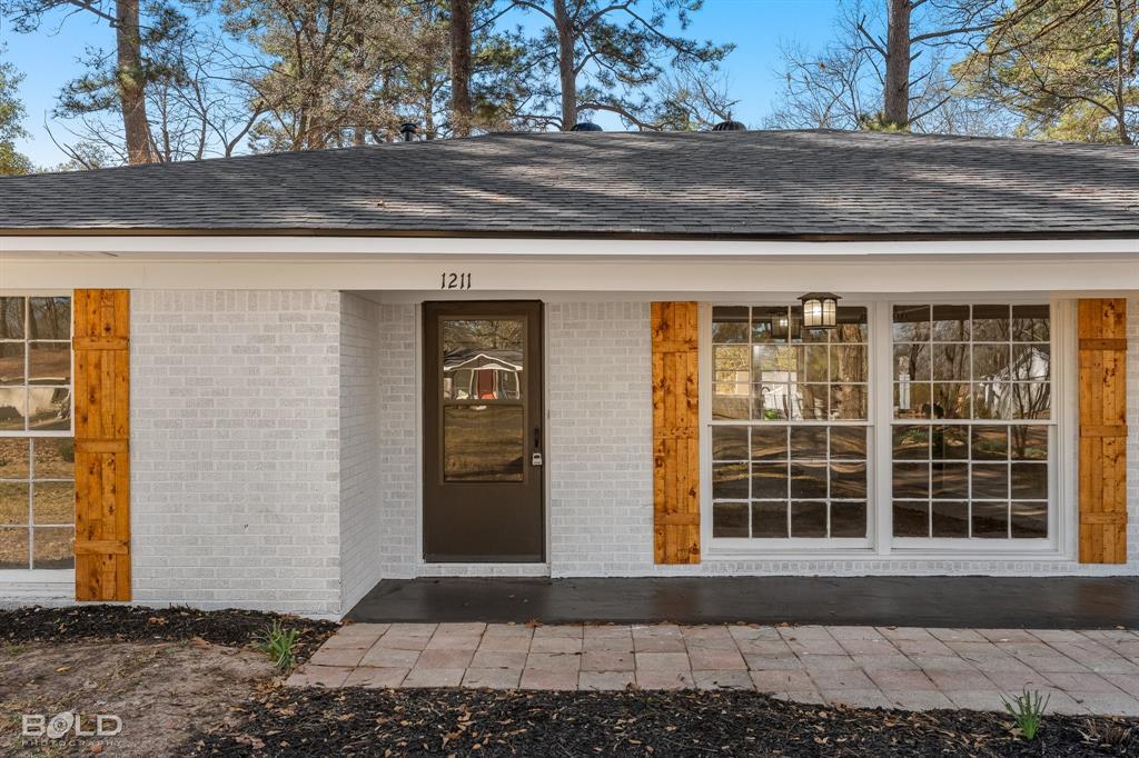 1211 Lee Street Benton, LA 71006 - Photo 2 of 39 a front view of a house