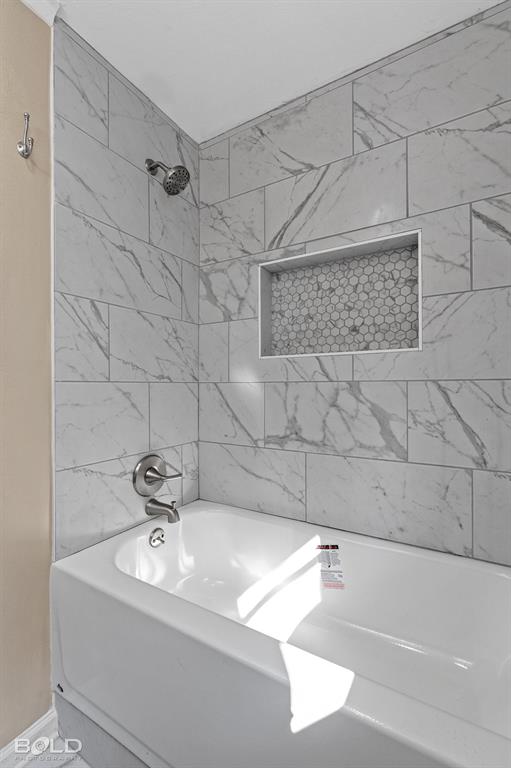 1211 Lee Street Benton, LA 71006 - Photo 23 of 39 a bathroom with a sink a toilet and mirror