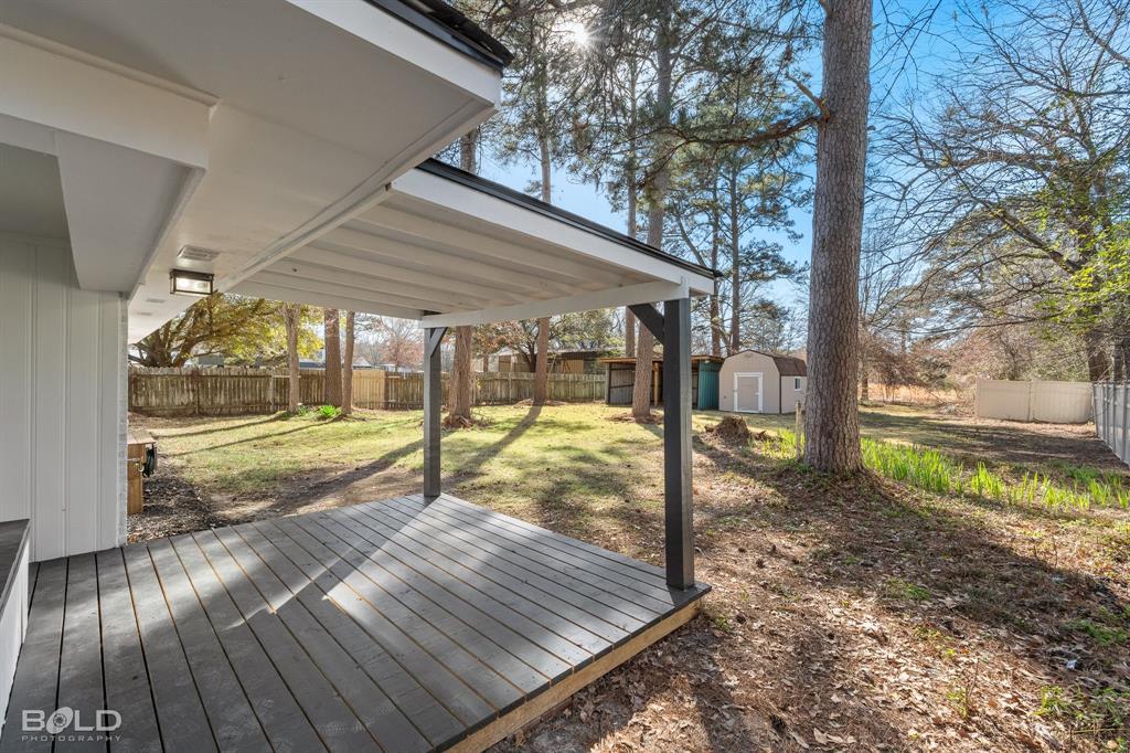 1211 Lee Street Benton, LA 71006 - Photo 27 of 39 a view of yard with wooden floor