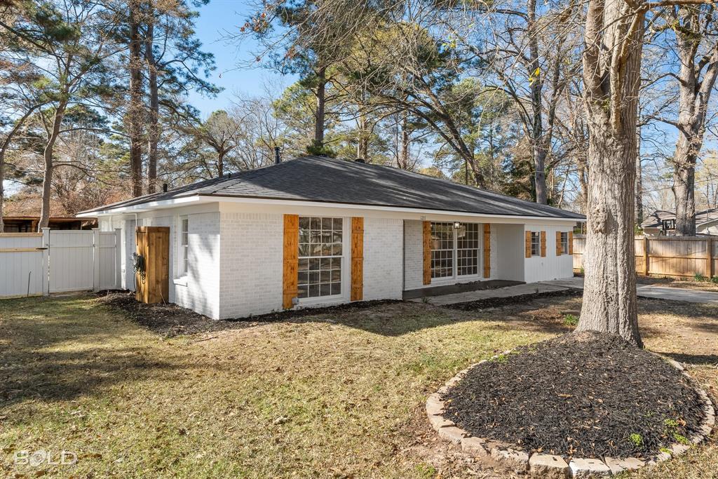 1211 Lee Street Benton, LA 71006 - Photo 3 of 39 a view of a house with a yard
