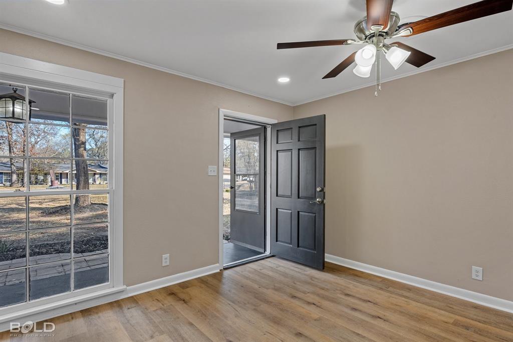 1211 Lee Street Benton, LA 71006 - Photo 5 of 39 a view of an empty room with a window