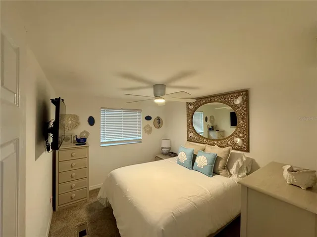 a living room with stainless steel appliances kitchen island granite countertop furniture and a view of kitchen